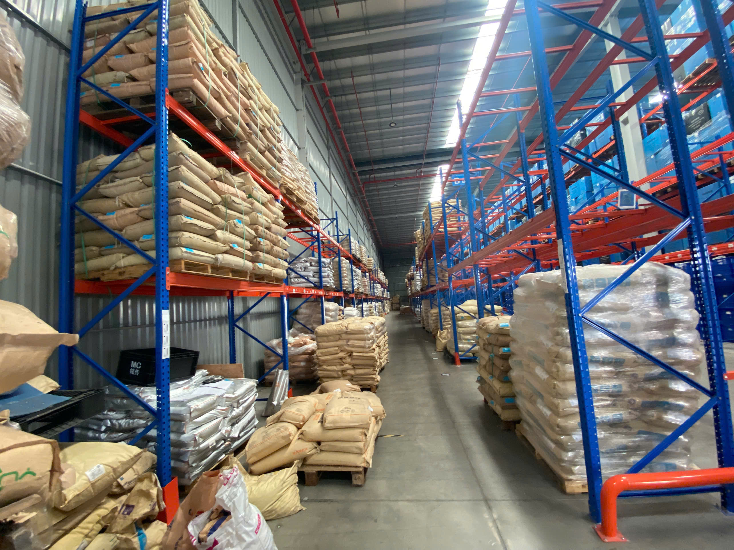 Interior view of modern finished raw materials warehouse.jpg